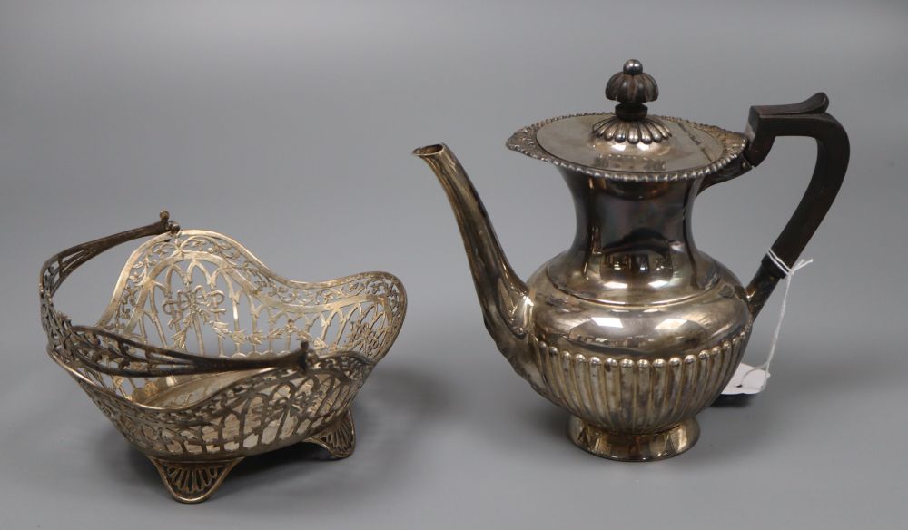A George V pierced silver basket by Goldsmiths & Silversmiths Co Ltd, London, 1910 & a small silver coffee pot.